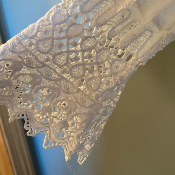 Cute lightweight button down top with embroidery on bottom and lower sleeve - Picture 3 of 6